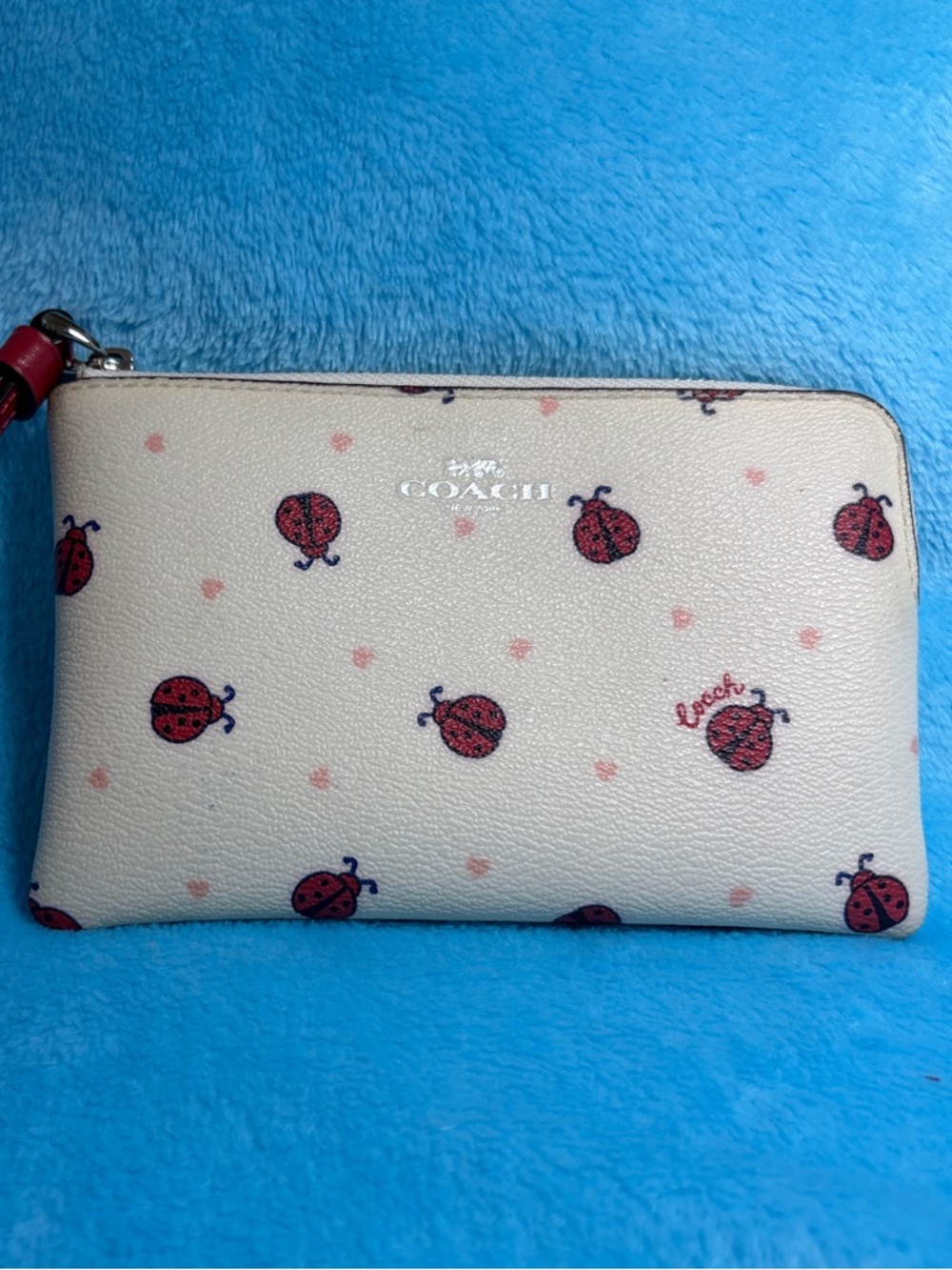 Coach Ladybug Cream Wristlet